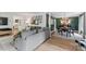 Spacious living room seamlessly connected to the dining area, perfect for entertaining at 10817 Brass Kettle Rd, Raleigh, NC 27614