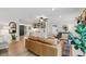 Stylish living room with hardwood floors, built-in shelving, and comfortable seating at 10817 Brass Kettle Rd, Raleigh, NC 27614
