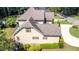 Aerial shot of a home featuring a brown roof, tidy yard, and beautifully maintained landscaping at 1101 Temple St, Raleigh, NC 27609