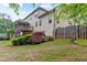 Spacious home backyard showing lush green landscaping and multi-level deck, great for outdoor activities at 1101 Temple St, Raleigh, NC 27609