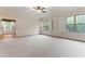 Bright bedroom with a ceiling fan and plantation shutters allowing natural light at 1101 Temple St, Raleigh, NC 27609