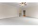 Spacious bonus room features neutral walls and carpet, plus access to another room at 1101 Temple St, Raleigh, NC 27609