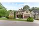 Beautiful exterior of this home highlighting its lawn and manicured bushes and trees at 1101 Temple St, Raleigh, NC 27609