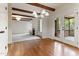 Spacious living area with hardwood floors, access to the porch, and view to living room at 1101 Temple St, Raleigh, NC 27609