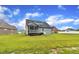 The large backyard includes a screened porch perfect for outdoor entertaining at 1109 Agio Ct, Zebulon, NC 27597