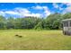 A well-maintained backyard with plenty of space for gardening and outdoor enjoyment at 1109 Agio Ct, Zebulon, NC 27597