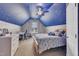 This bedroom features a ceiling with a stars pattern and ceiling fan at 1109 Agio Ct, Zebulon, NC 27597