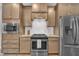 Kitchen featuring stainless steel appliances, granite countertops, and ample cabinet space at 1109 Agio Ct, Zebulon, NC 27597