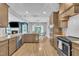 Modern kitchen featuring granite countertops, stainless steel appliances, and open layout at 1109 Agio Ct, Zebulon, NC 27597