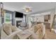 Cozy living room showcasing a fireplace, recessed lighting, and open access to the dining room at 1109 Agio Ct, Zebulon, NC 27597