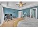 Inviting primary bedroom featuring neutral carpet, a tray ceiling, and bright white trim at 1109 Agio Ct, Zebulon, NC 27597