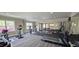 Well-equipped gym featuring various exercise machines, providing a convenient fitness option for residents at 1116 Trotter Bluffs Dr, Holly Springs, NC 27540