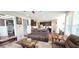 Spacious living area that flows into an open kitchen, featuring hardwood floors at 1116 Trotter Bluffs Dr, Holly Springs, NC 27540