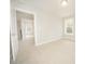 Neutral bedroom with plush carpet, fresh paint, and ample natural light at 112 Ambergate Ct, Rocky Mount, NC 27804