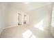 Bright bedroom features neutral carpet, fresh paint, and ample natural light at 112 Ambergate Ct, Rocky Mount, NC 27804