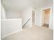 Bright hallway features neutral carpet and leads to the bathroom and bedroom at 112 Ambergate Ct, Rocky Mount, NC 27804