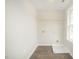 Bright laundry room with vinyl flooring and convenient utility connections at 112 Ambergate Ct, Rocky Mount, NC 27804