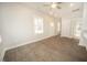 Inviting living space with natural light and hardwood floors open to kitchen at 112 Ambergate Ct, Rocky Mount, NC 27804