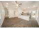 Bright, open-concept living space connects to the modern kitchen with stainless steel appliances at 112 Ambergate Ct, Rocky Mount, NC 27804