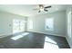Spacious living room featuring a ceiling fan, recessed lights, and natural light at 117 Ambergate Ct, Rocky Mount, NC 27804
