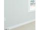 Close-up of a wall, baseboard and carpet, showcasing neutral tones and electrical outlet at 117 Ambergate Ct, Rocky Mount, NC 27804