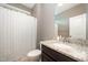 Stylish bathroom featuring granite countertop, modern fixtures, and neutral color scheme at 1201 Pleasant Falls Ct, Wake Forest, NC 27587