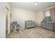 Adorable Bedroom with soft colors, cozy rocking chair, crib, dresser, and sweet decor accents at 1201 Pleasant Falls Ct, Wake Forest, NC 27587