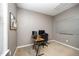 Neutral-toned office space offers a functional and minimalist design perfect for focused work at 1201 Pleasant Falls Ct, Wake Forest, NC 27587