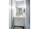 Compact bathroom featuring a single vanity, and modern lighting at 121 Westview Dr # 22, Carrboro, NC 27510