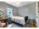 Comfortable bedroom featuring hardwood floors, and a desk at 121 Westview Dr # 22, Carrboro, NC 27510