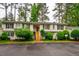 Inviting townhouse exterior with multiple units, each featuring private entrances and parking at 121 Westview Dr # 22, Carrboro, NC 27510