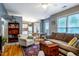 Open-concept living area with hardwood floors and view to the kitchen and dining space at 121 Westview Dr # 22, Carrboro, NC 27510