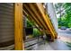 A shady porch swing offers a relaxing spot beneath the stairway of this home at 121 Westview Dr # 22, Carrboro, NC 27510