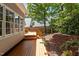 This home features a beautiful wood deck that overlooks a well-maintained yard at 1224 Wedgeland Dr, Raleigh, NC 27615