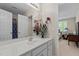 Spacious bathroom featuring white countertops, floral accents, and natural light at 1224 Wedgeland Dr, Raleigh, NC 27615