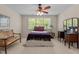 Cozy bedroom featuring a bright window and neutral tones at 1224 Wedgeland Dr, Raleigh, NC 27615