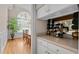 Elegant dining room visible from the butler's pantry, perfect for entertaining guests at 1224 Wedgeland Dr, Raleigh, NC 27615