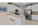 Well-equipped kitchen boasts stainless steel appliances and a breakfast bar at 1224 Wedgeland Dr, Raleigh, NC 27615