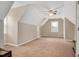 A carpeted bedroom featuring neutral walls, a ceiling fan and a window at 124 Windmere Dr, Angier, NC 27501