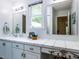 Bright bathroom with a large vanity, ample counter space, and vanity lighting at 1514 John Jones Rd, Bahama, NC 27503