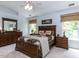 Comfortable main bedroom with neutral walls, a ceiling fan, and coordinated furniture at 1514 John Jones Rd, Bahama, NC 27503