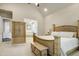 Main bedroom boasts neutral colors, carpet flooring and an entrance to the ensuite bathroom at 1540 Sandybrook Ln, Wake Forest, NC 27587