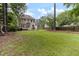 Spacious backyard featuring a deck perfect for outdoor gatherings at 1605 Hall Blvd, Garner, NC 27529