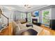 Inviting living room with hardwood floors, fireplace, and neutral color scheme providing a cozy atmosphere at 1605 Old London Way, Apex, NC 27523