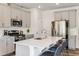 Beautiful kitchen featuring an island, stainless steel appliances, and gray cabinetry at 235 Paramount Dr, Smithfield, NC 27577
