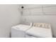 Laundry room with new, white washer and dryer at 235 Paramount Dr, Smithfield, NC 27577