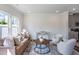 Cozy living room with a plush sofa, accent chairs, and a stylish coffee table at 235 Paramount Dr, Smithfield, NC 27577