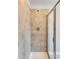 Tiled shower with glass door and modern fixtures creates a spa-like experience at 235 Paramount Dr, Smithfield, NC 27577