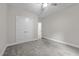 Carpeted bedroom featuring a ceiling fan, closet, and neutral colored walls at 1850 Willie Pace Rd, Burlington, NC 27217