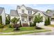 Charming two-story home with a well-manicured lawn and inviting front porch at 204 Mill Chapel Rd, Chapel Hill, NC 27517